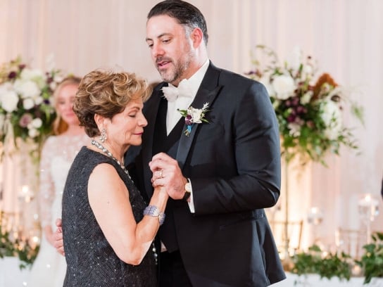 a coouple dancing at a wedding