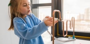 child washing hands