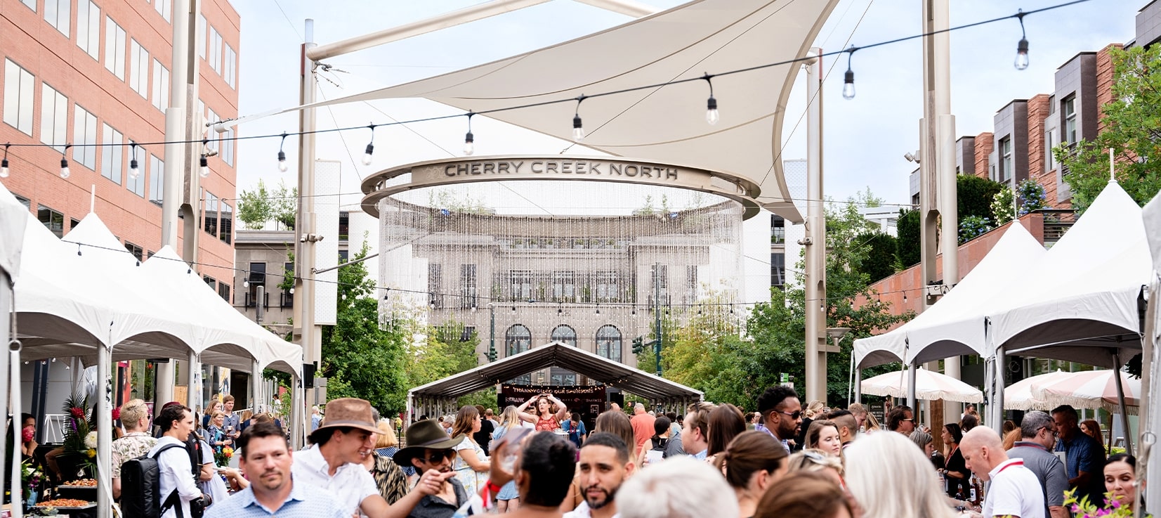 groups of people enjoying cherry creek in the summer time