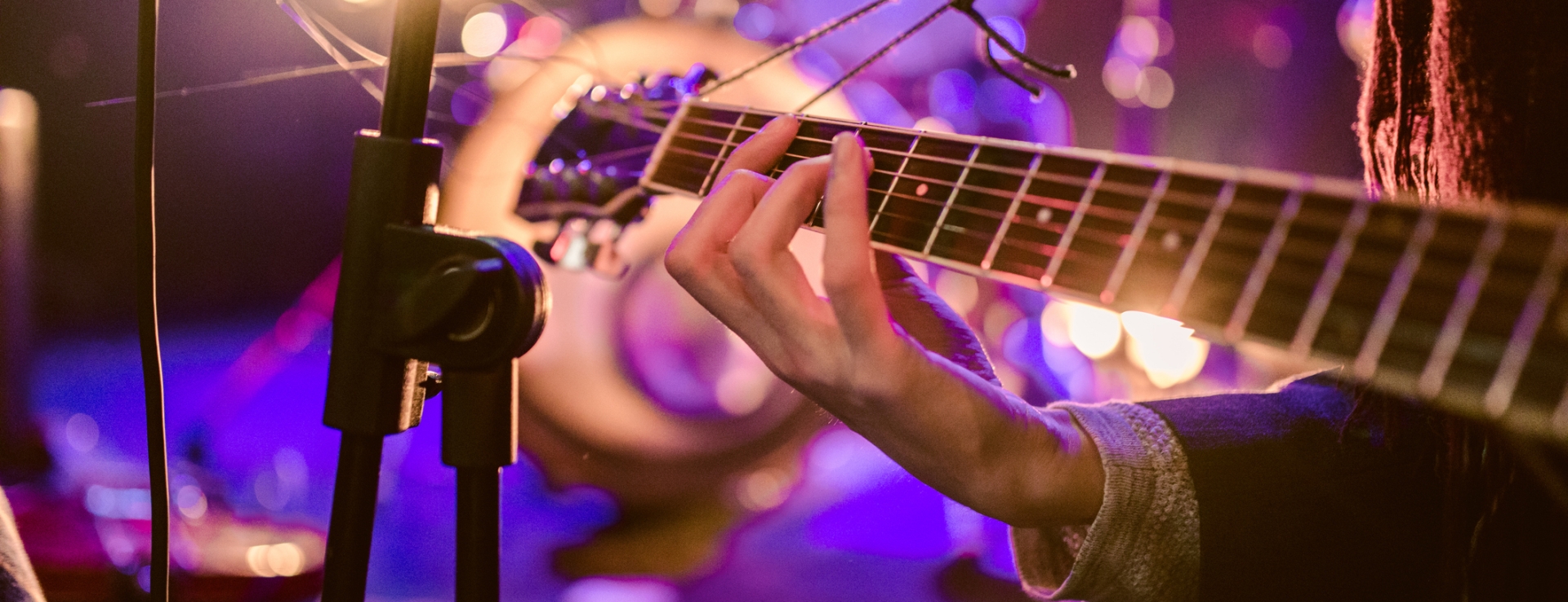 Someone playing a guitar