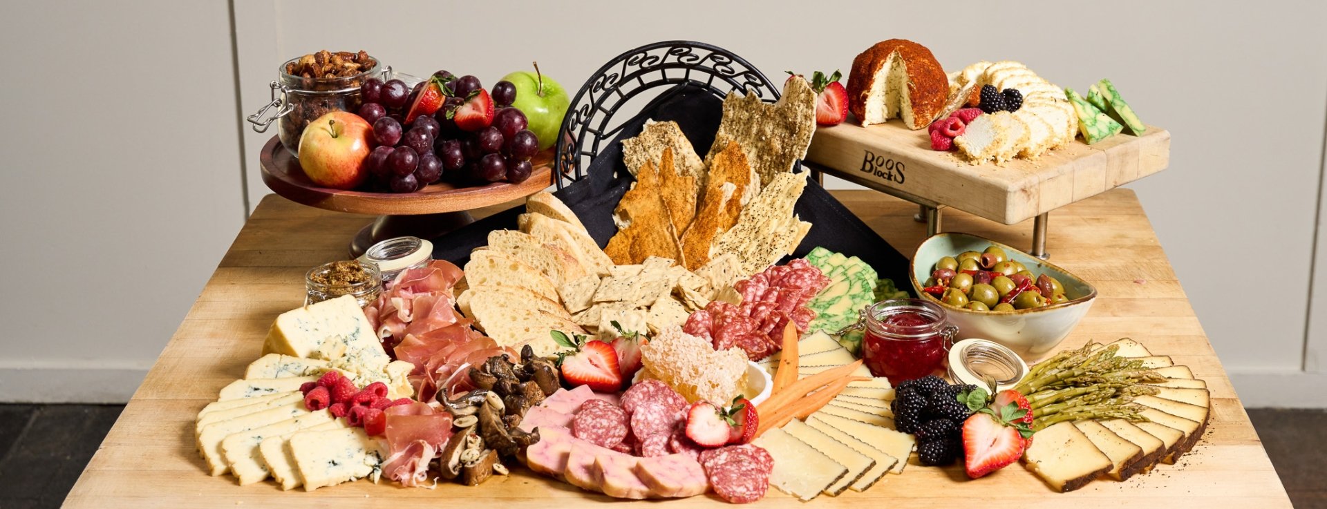 A charcuterie board sitting on a table at Hotel Clio