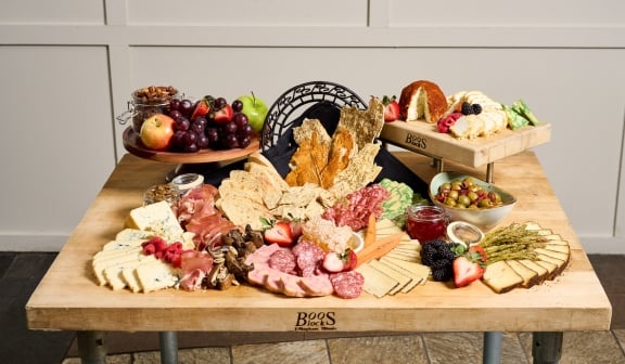 A charcuterie board sitting on a table at Hotel Clio