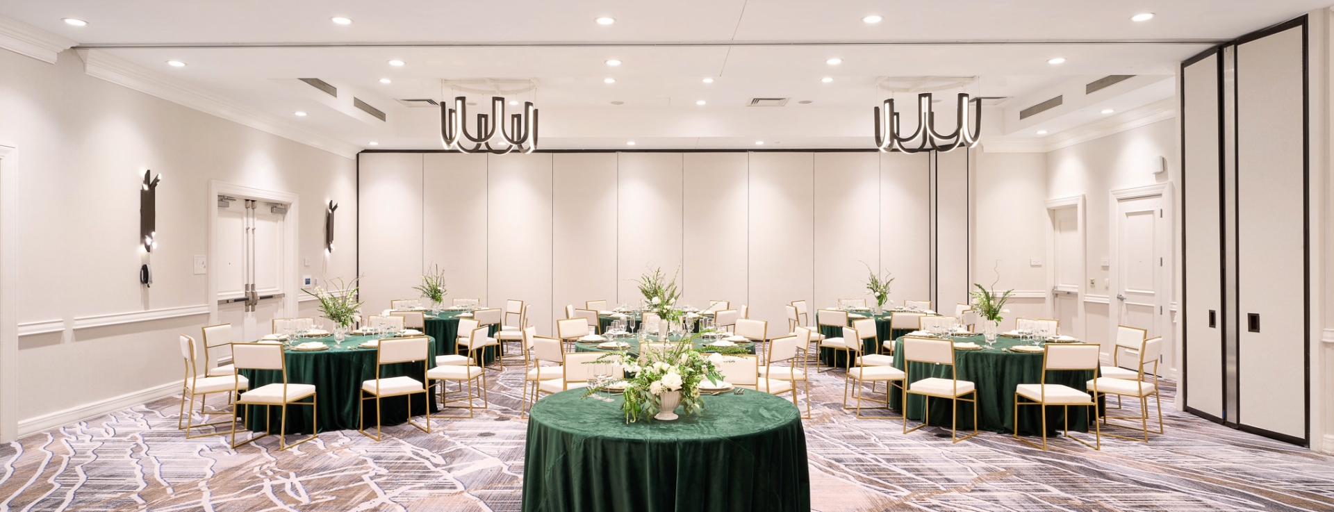 Large meeting space at Hotel Clio with round tables