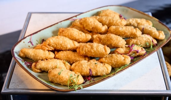 Food on a tray prepared by Hotel Clio