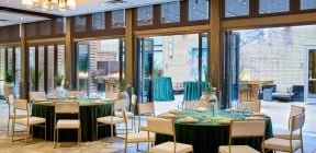 Dining area at Hotel Clio with a large out door dining section in the background