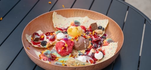 Close up of a bowl of food sitting on a table